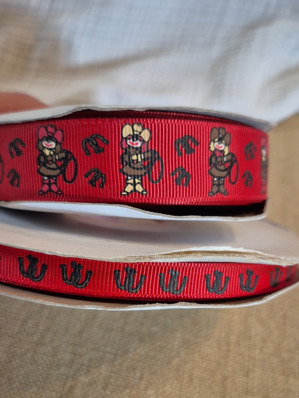 Grosgrain 7/8"W• 25 yds• Red • Cartoon Cowgirl▪︎3/8"W• 50yds• Red• HorseShoes